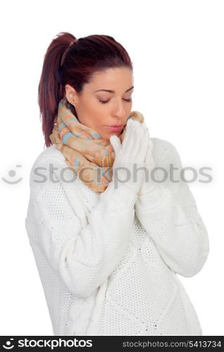 Pretty woman with gloves and scarf warming up hands isolated on white