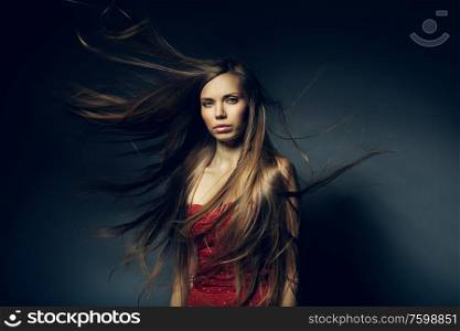 pretty woman with long windy hair