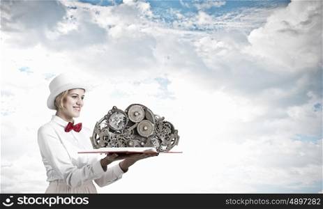 Pretty woman with opened book. Young woman in white cylinder and red bowtie with book in hands