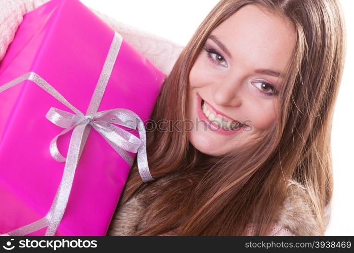 Pretty woman with pink box gift. Christmas holiday. Pretty happy woman with pink rose box gift isolated on white. Christmas xmas winter time season concept.