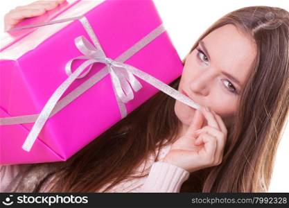 Pretty woman with pink box gift. Christmas holiday. Pretty happy woman with pink rose box gift isolated on white. Christmas xmas winter time season concept.