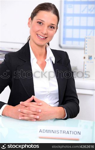 pretty woman working at an administration service