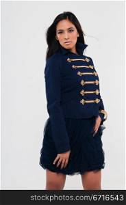Pretty young Asian woman in a navy jacket and skirt
