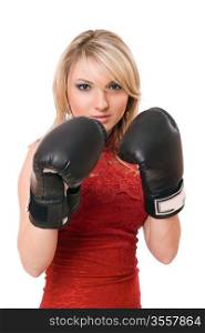 Pretty young blond girl in boxing gloves