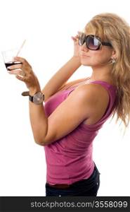 Pretty young blond woman with glass of cocktail. Isolated