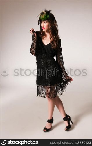Pretty young Chinese woman in a black dress