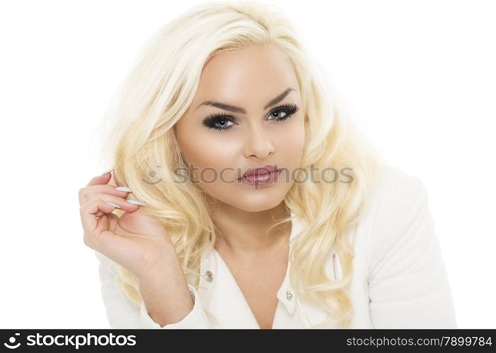 Pretty Young Female Touching her Wavy Blond Hair. Close up Portrait of Pretty Blond Female in White Fashion Touching her Hair While Smiling at the Camera. Isolated on White Background.