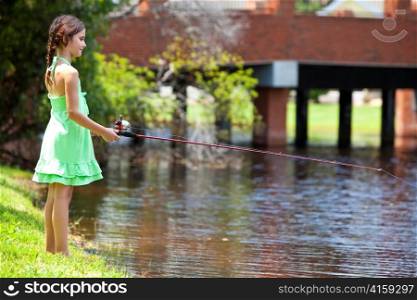 Pretty Young Girl Child Fishing On A RIver