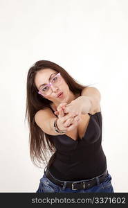 Pretty young girl in black corset with glasses on grey background