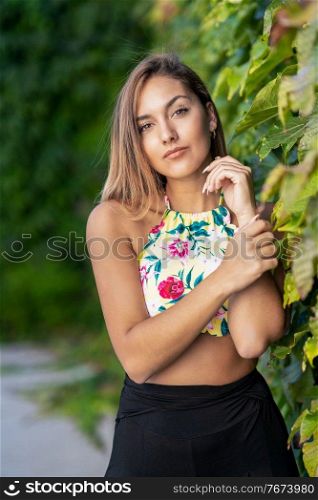 Pretty young girl with beautiful straight hair standing outdoors. Pretty young girl with beautiful straight hair