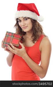 Pretty young girl with christmas box and santa hat