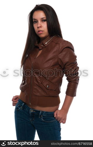 Pretty young petite Latina in a brown leather jacket