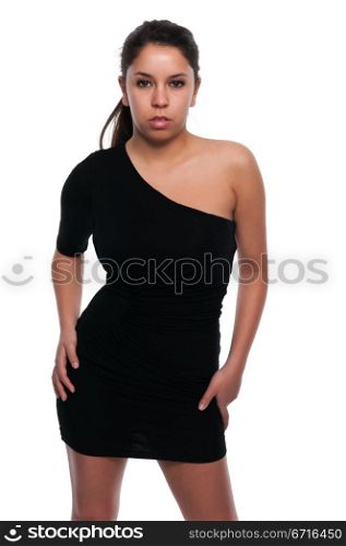 Pretty young petite Latina in a little black dress