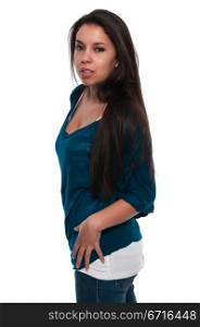 Pretty young petite Latina in a teal blouse and jeans