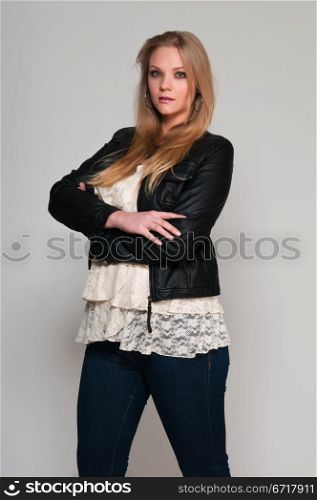 Pretty young plus size blonde in a frilly blouse