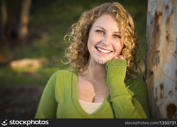 Pretty Young Smiling Woman Outdoor Portrait.