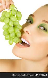 Pretty young woman closeup with grape on the white background