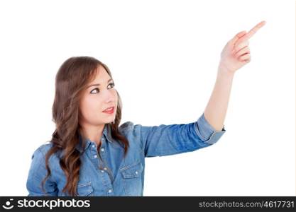 Pretty young woman indicating something with the finger isolated on a white background