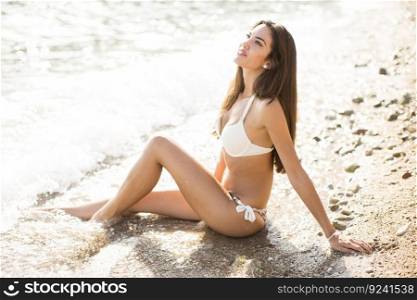 Pretty young woman on the beach