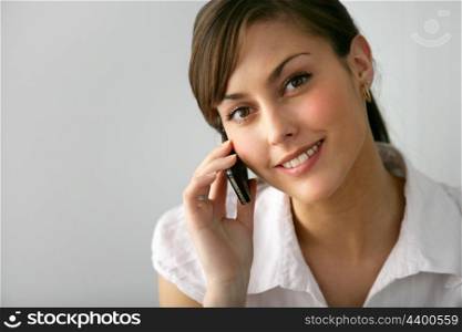 Pretty young woman on the phone