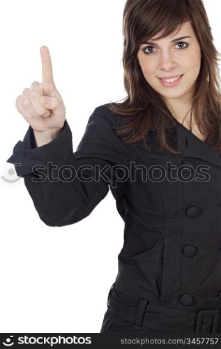 Pretty young woman pointing over white background
