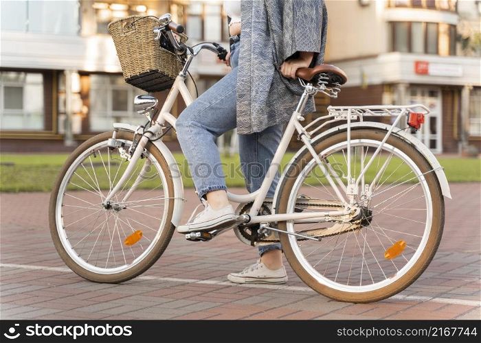 pretty young woman riding bike
