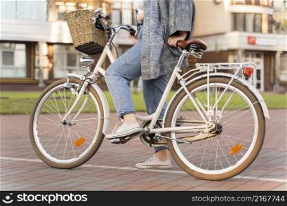 pretty young woman riding bike