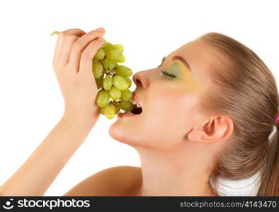 Pretty young woman with grape closeup on the white background