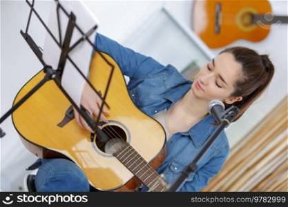 pretty young woman with guitar