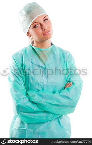 prety nurse in green surgery dress and a cap looking in camera over white