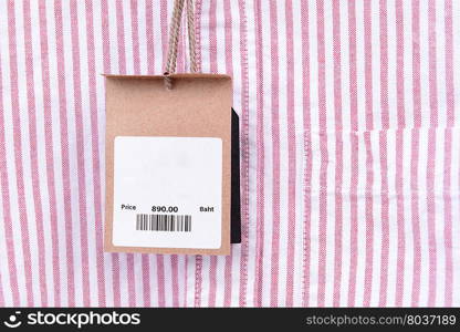 price tag with barcode on a shirt