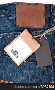 price tag with barcode on jeans textured