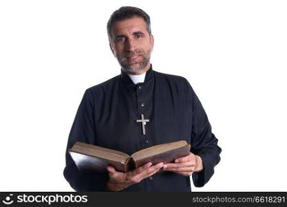 Priest portrait with Holy Bible in hands isolated
