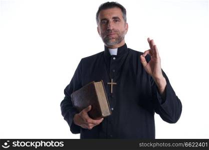 Priest with ok finger hands sign isolated background