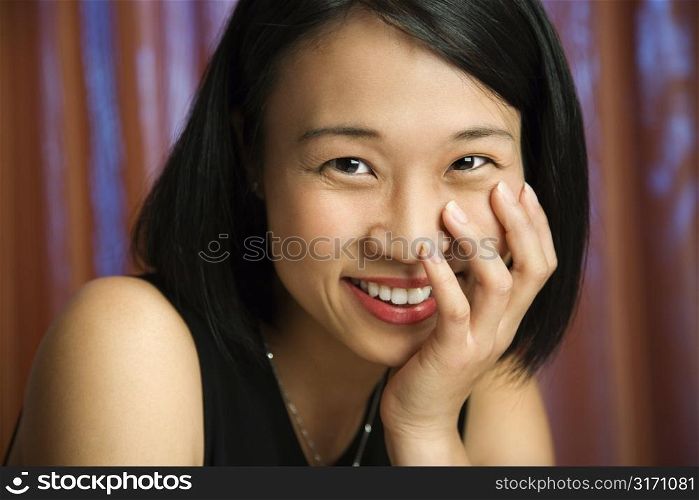 Prime adult Asian female portrait.