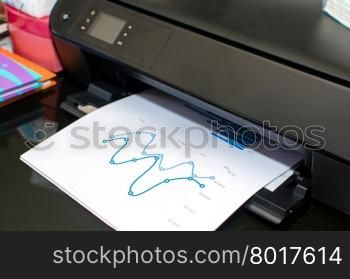 print a document.On the table in office.