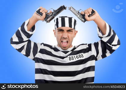 Prisoner with gun isolated on white