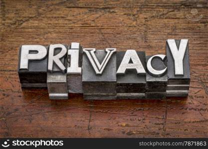 privacy word in mixed vintage metal type printing blocks over grunge wood