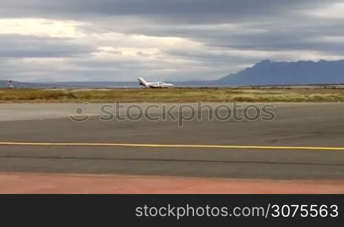 Private jet landing on the airport of Puerto Natales, Chile