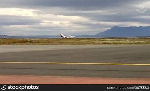 Private jet landing on the airport of Puerto Natales, Chile
