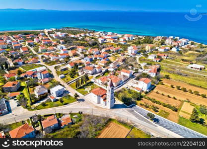 Privlaka village near Zadar tourist destination church and waterfront aerial view, Dalmatia region of Croatia