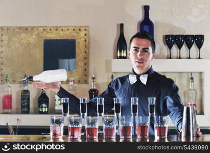 pro barman prepare coctail drink and representing nightlife and party event concept