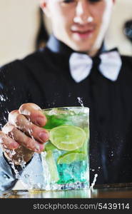 pro barman prepare coctail drink and representing nightlife and party event concept