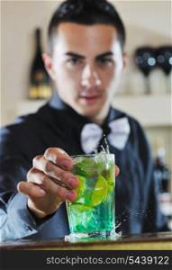 pro barman prepare coctail drink and representing nightlife and party event concept