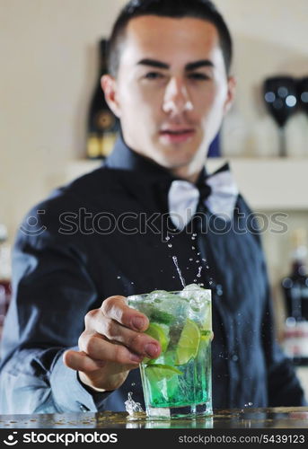 pro barman prepare coctail drink and representing nightlife and party event concept