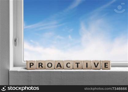 Proactive sign in a window sill on a bright day with a blue sky outside