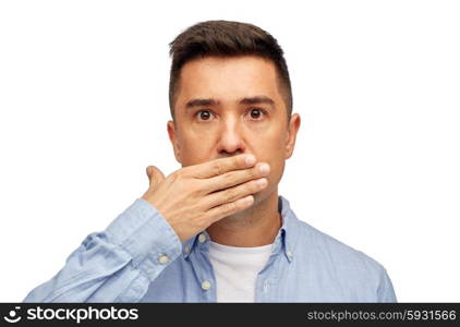 problem, emotion, sorrow and people concept - face of middle aged latin man covering his mouth with hand palm