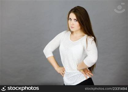 Problem expressions concept. Irritable attractive woman having angry wrathful frustrated face expression. Attractive woman having angry frustrated face expression