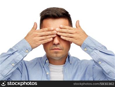 problem, sight, vision, stress and people concept - face of middle aged latin man covering his eyes with hand palms