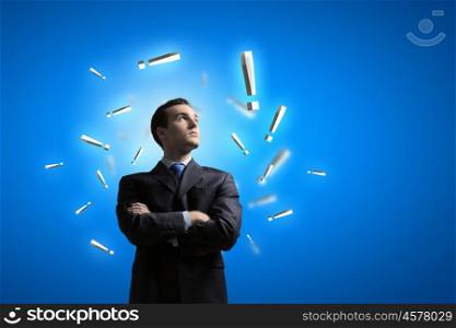 Problem solving. Image of confident businessman with arms crossed on chest